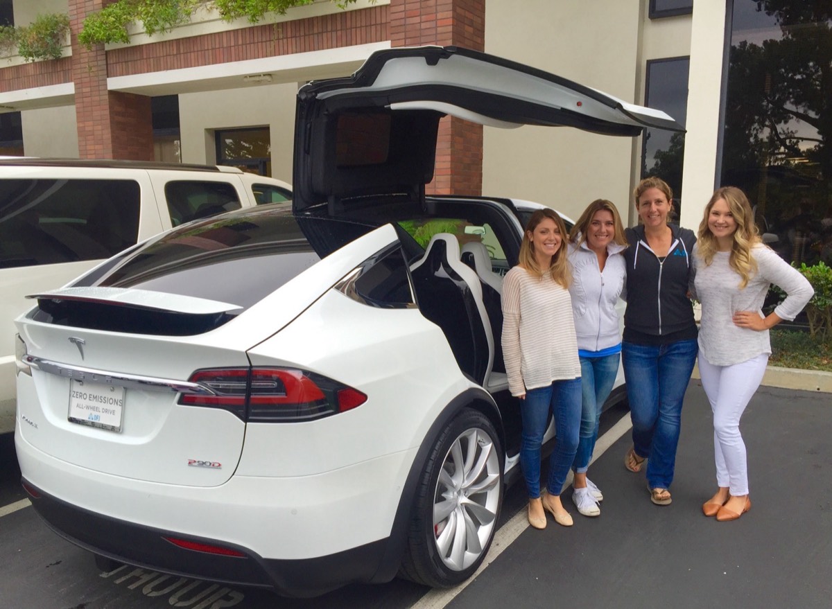 Tesla Model X with falcon wing doors raised